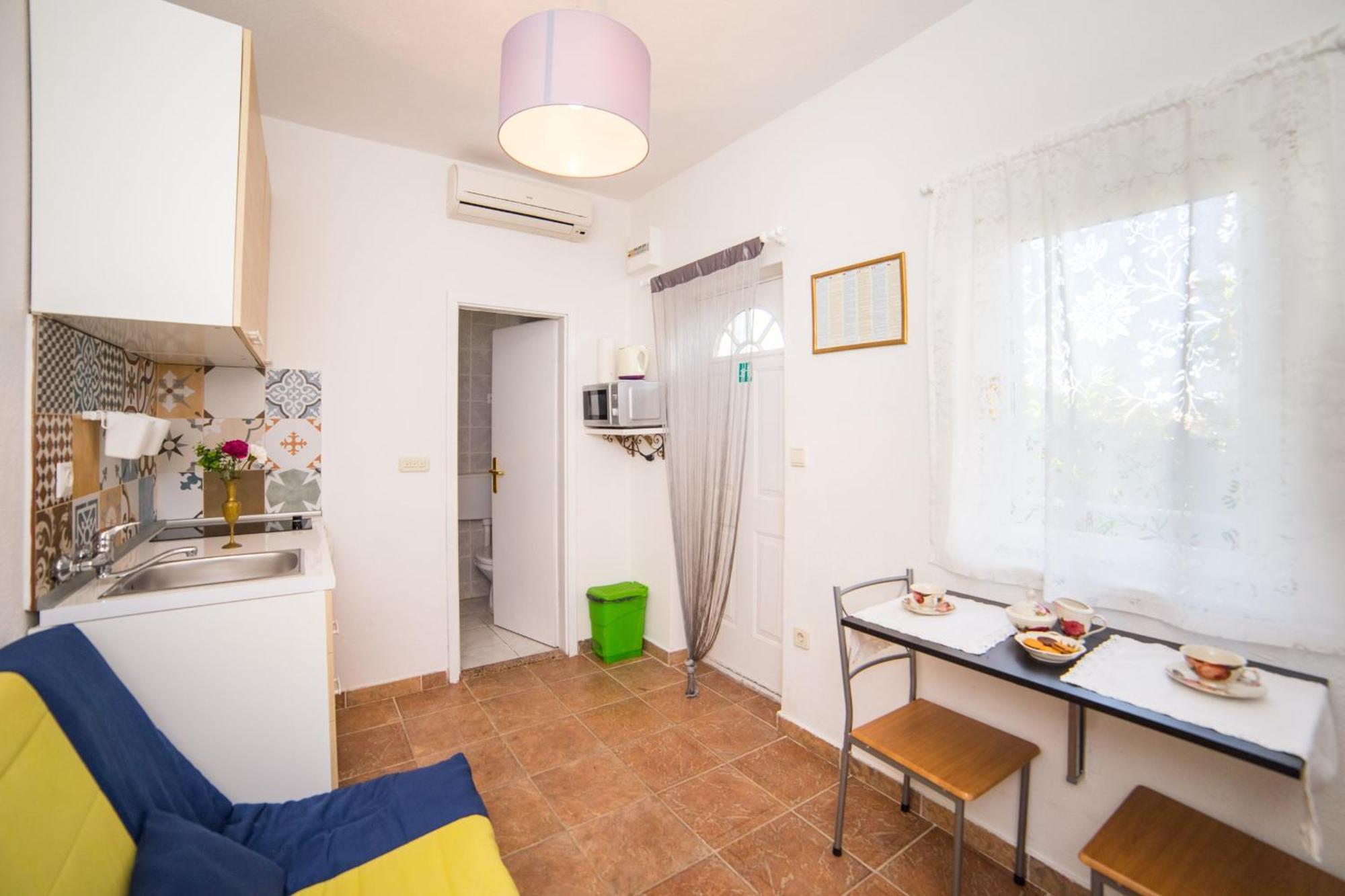 Apartmani Kala Podgora Rom bilde